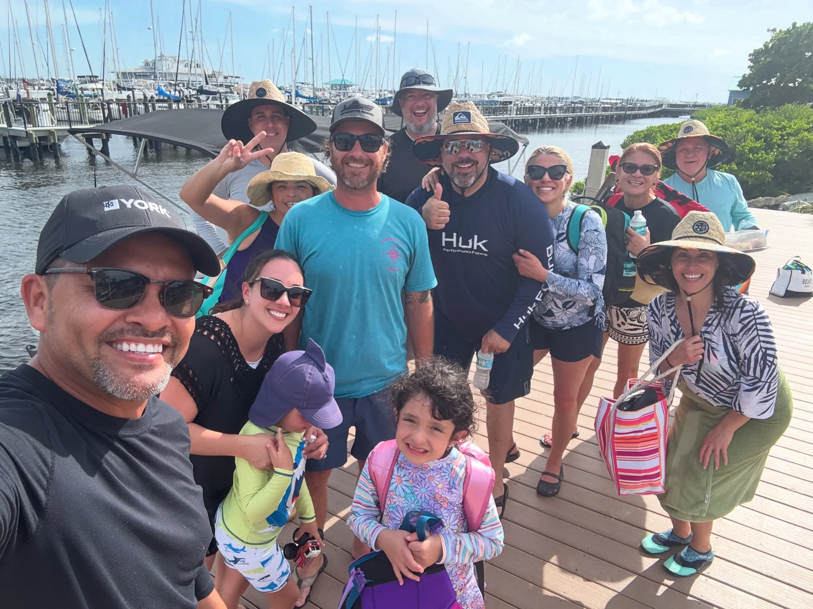 Guests meeting beside a boat dock