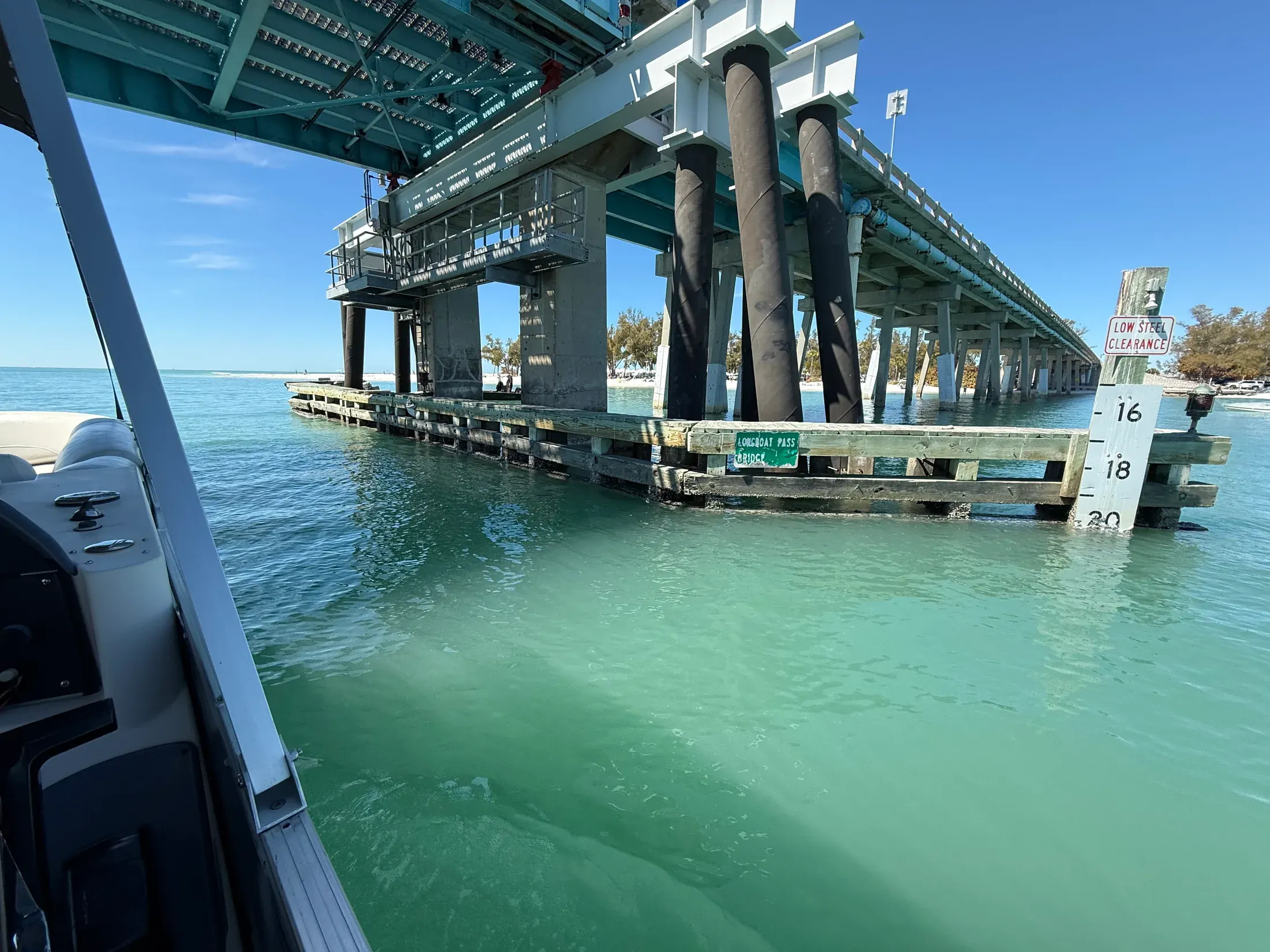 View from a boat passing beneath a bridge