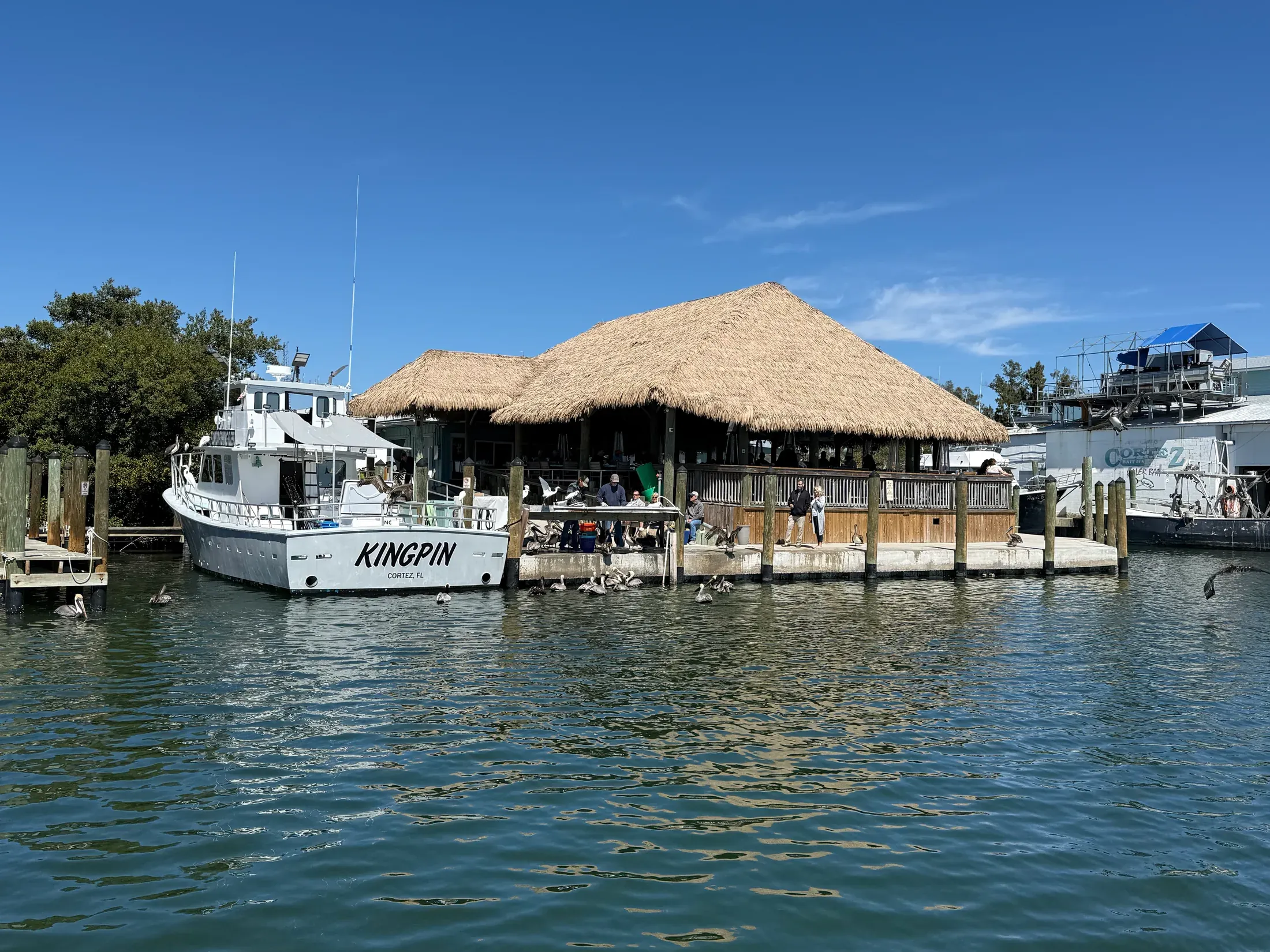 Boats beside a waterfront restaurant