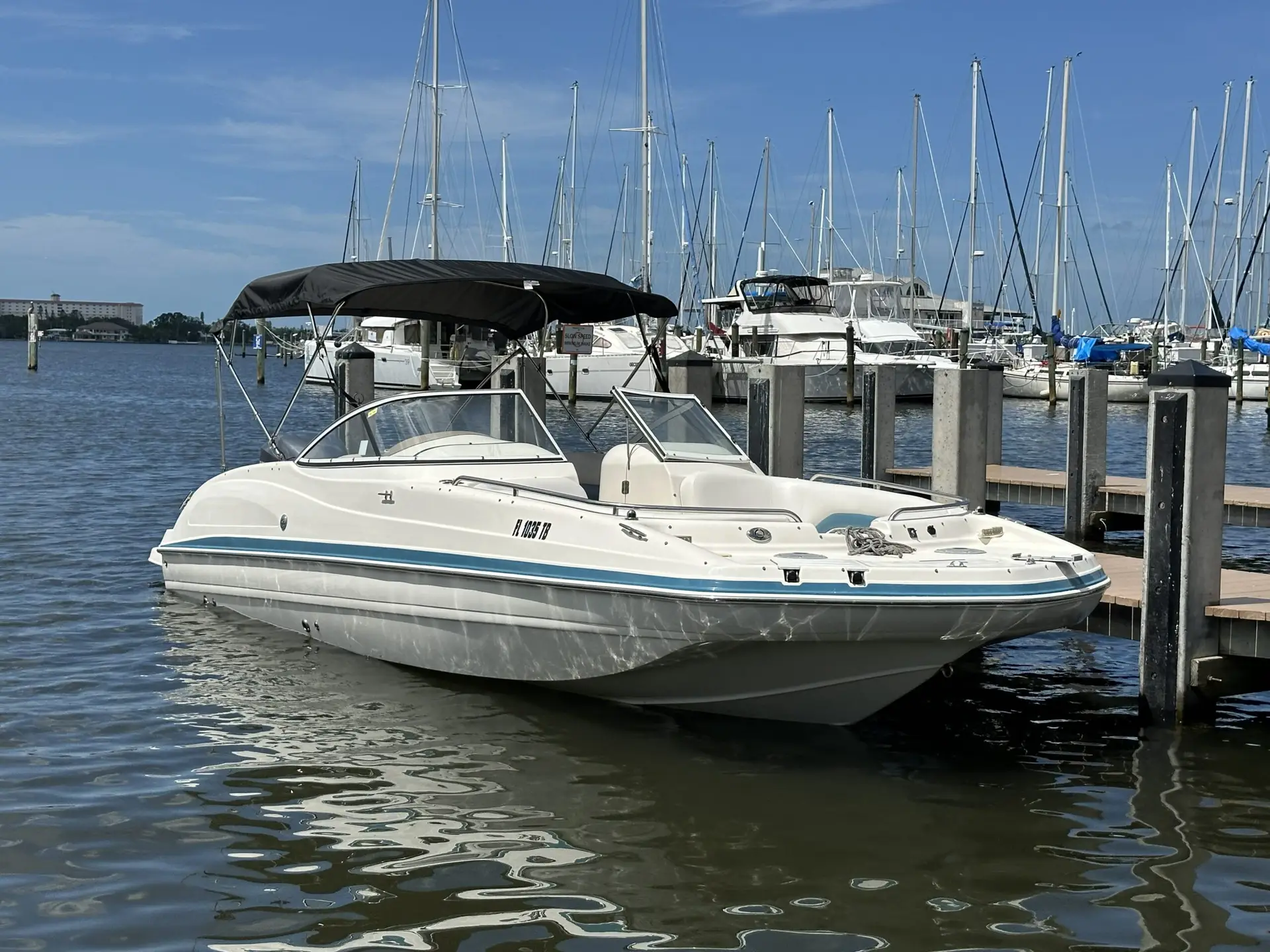 Hurricane Sundeck 237 deck boat rental at the Holmes Beach boat ramp
