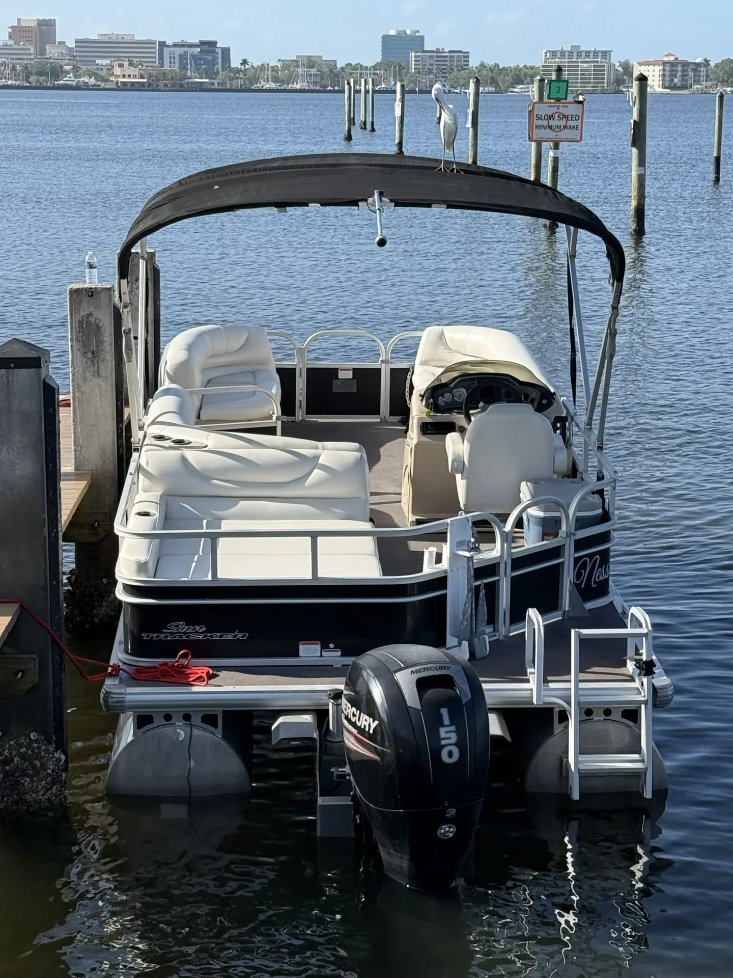 Compass Boat Rentals tritoon on the water off Anna Maria Island