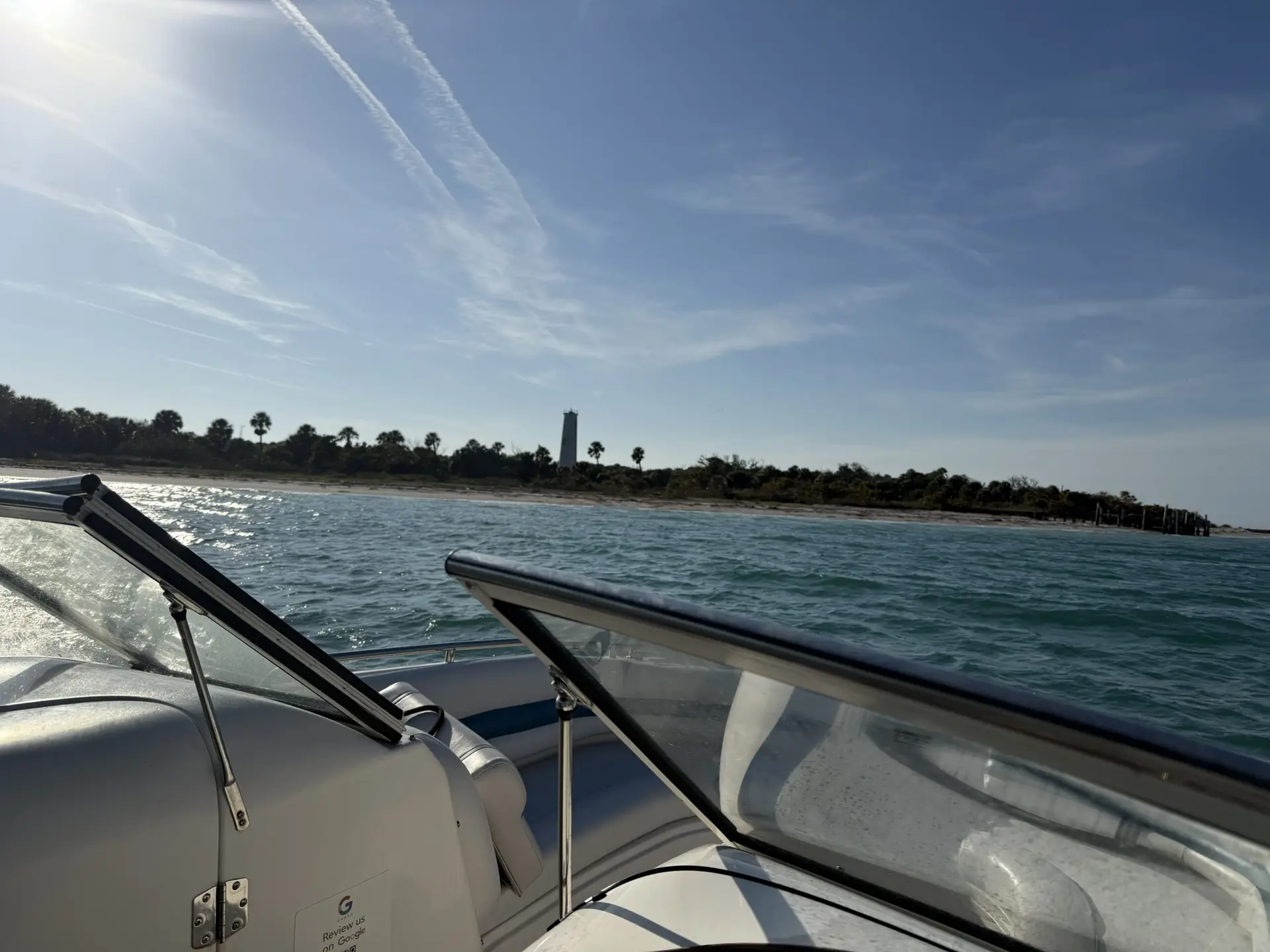 Egmont Key lighthouse seen from a Compass boat rental
