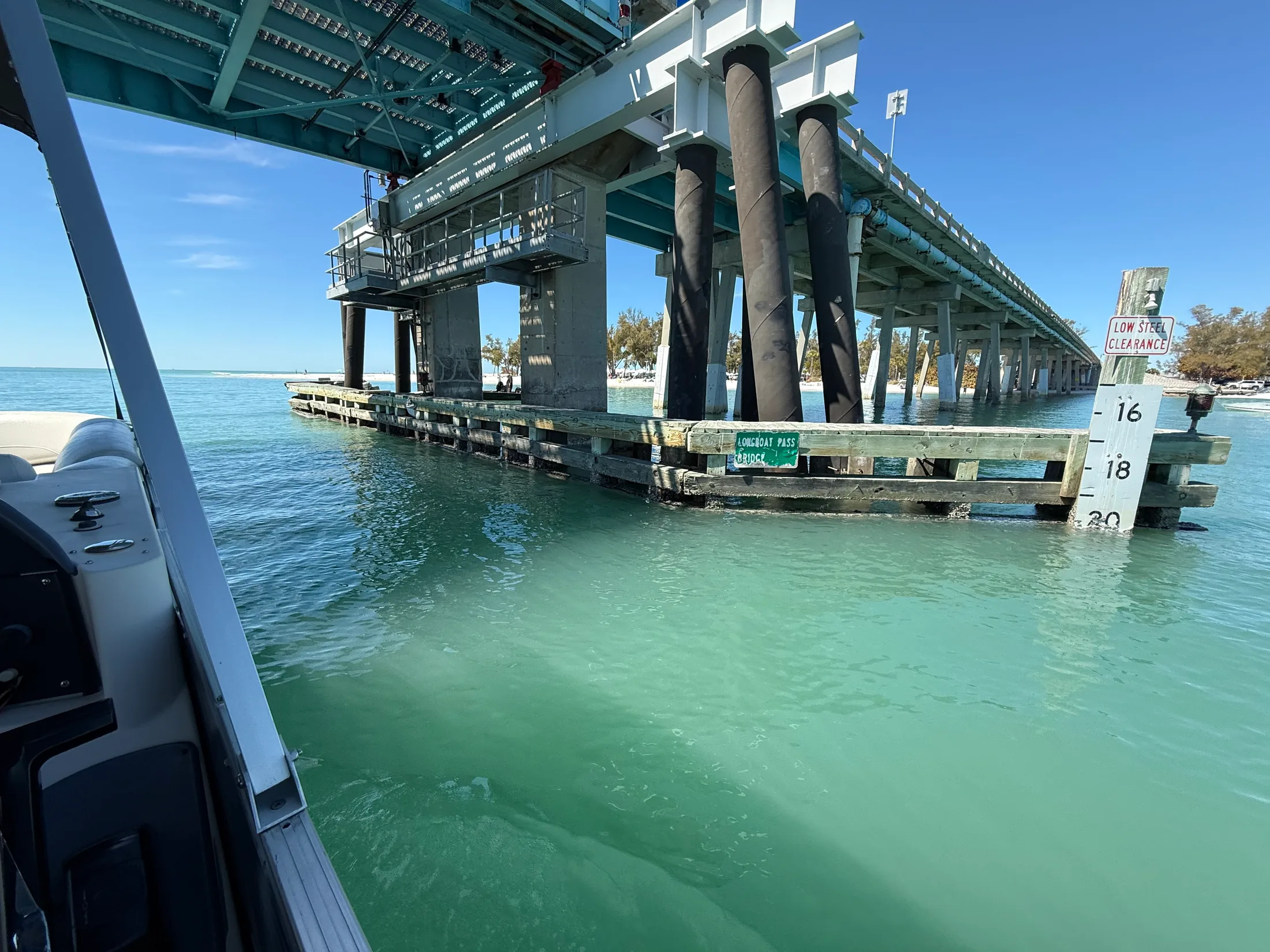 View from a boat passing beneath a bridge