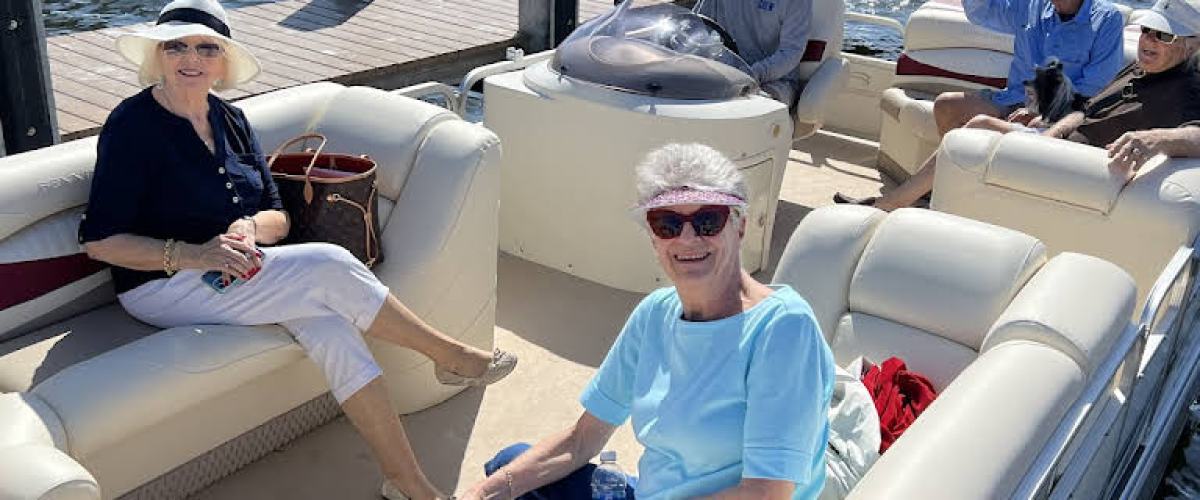 a group of people on a pontoon