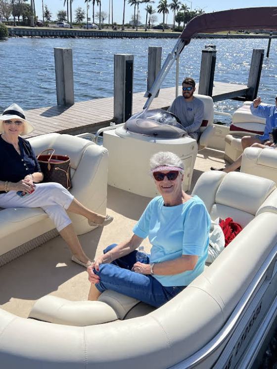 a group of people on a pontoon