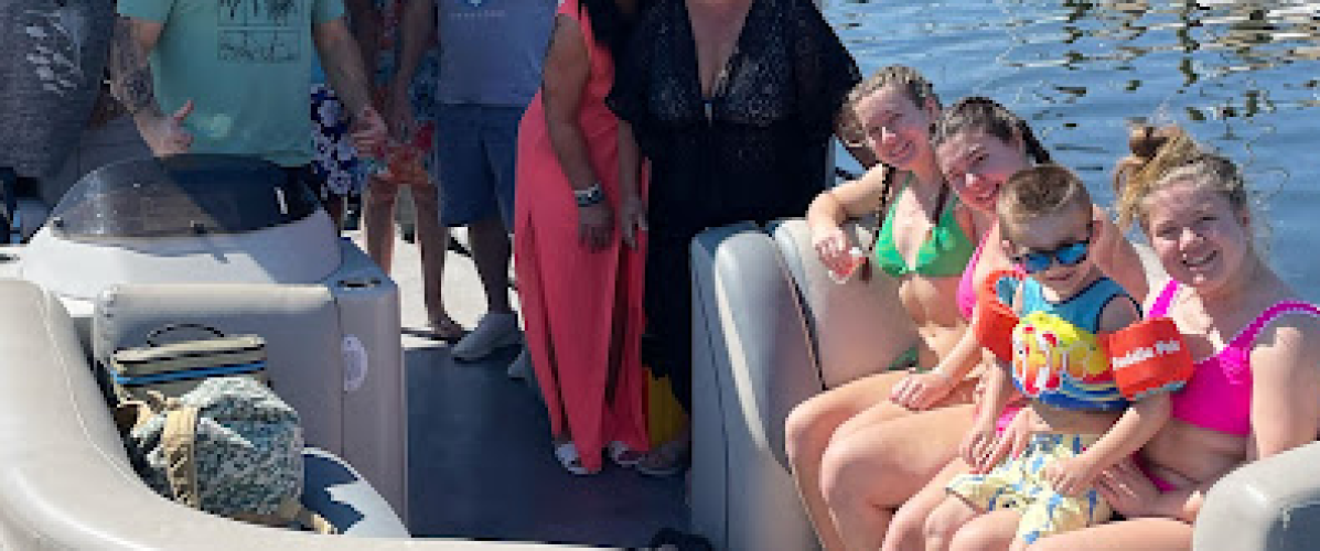 a group of people on a pontoon