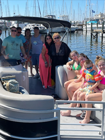a group of people on a pontoon